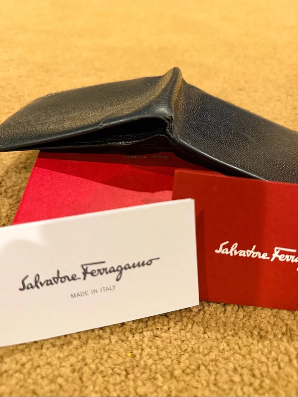 Salvatore Ferragamo Black Pebbled Leather Bi-Fold Wallet with Metal Logo